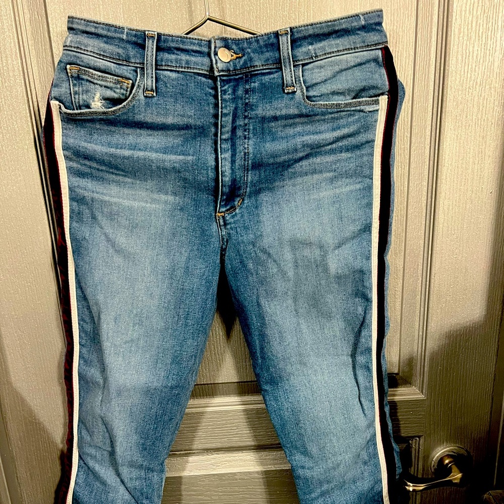 Light jeans with red velvet stripe
